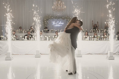 At their dream wedding, the newlyweds share a mesmerizing dance while sparklers illuminate the night.